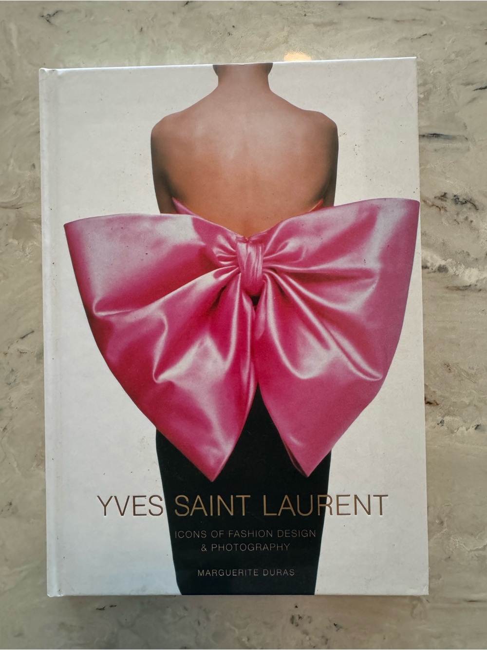 Yves Saint Laurent Hardcover with Vibrant Pink Bow Cover